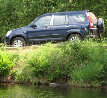 Honda CR-V 2006 on small countryside road